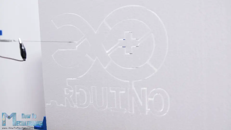 Arduino Logo being shaped on an Arduino CNC foam cutting machine
