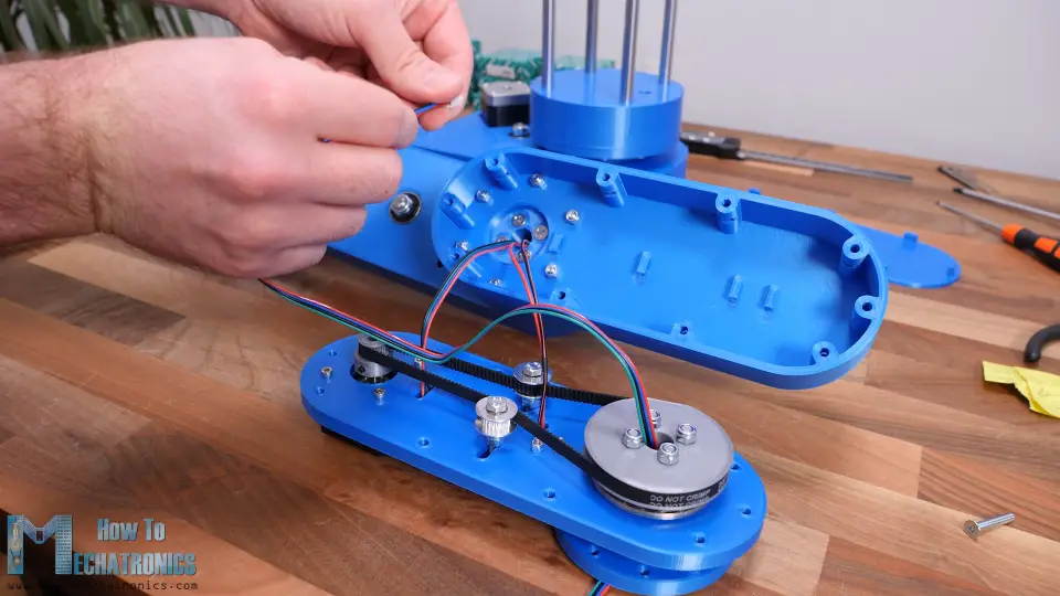 Conducting wires through the hollow robot joints