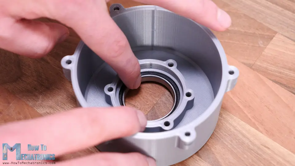 Inserting the bearings into the housing