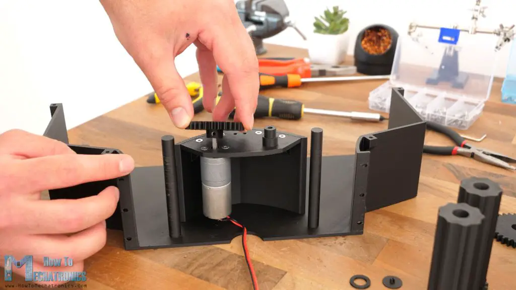 Installing the magazine rollers motor for the nerf blaster turret