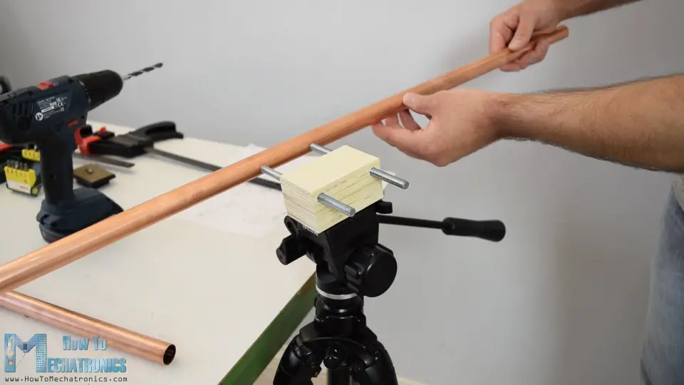 mounting the rails onto the base