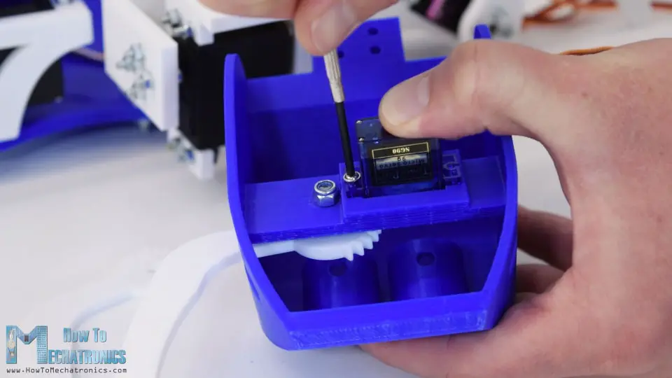 securing the S90 micro servo for the mandibles mechanism